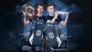 The promotional poster for Secretlab and OG's new partnership. Featuring the new special edition gaming chair with Ceb and N0Tail standing behind it. Ceb is holding the Aegis shield