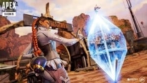 The Apex Legends character Loba uses her ultimate ability, Black Market Boutique on the battlefield