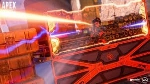 Apex Legends character Rampart shooting a gun behind cover on a battlefield