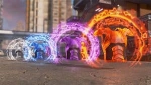 Four sets of armor in Apex Legends glow in different colors on a city street