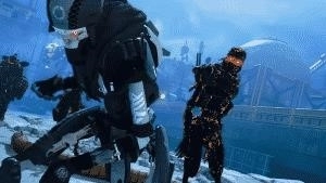 Three zombie looking robots wander in a snowy military base in Apex Legends