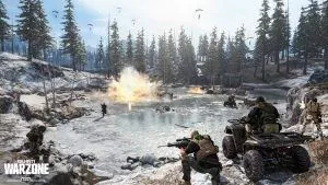 A group of soldiers battles around a lake with guns and explosions around with one on a four wheeler and some parachuting down from the sky in Call of Duty Warzone