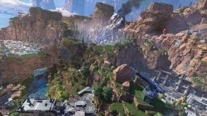 The King's Canyon map from Apex Legends, a futuristic military facility surrounded by large, rocky mountains