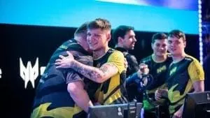 The roster of Na`Vi congratulate one another after a win