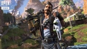 Apex Legends character Fuse stands confidently holding a small robot and a rifle in the middle of a valley with palm trees and a large shack