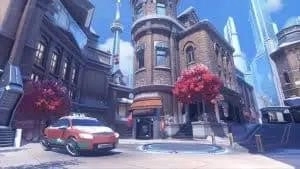 A shot of Overwatch 2's new map, Toronto, showing a city street lined with some snow.