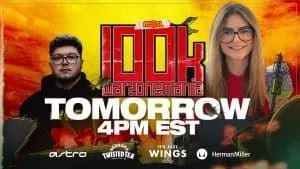 Айдан «Айдан» Конрад и iSmixie появляются по обе стороны от слов «100k Warzone Mania Tomorrow 16:00 EST» жирными красными и белыми буквами.  За ними изображено поле боя в зоне боевых действий, самолет летит по ярко-оранжевому небу с послесвечением взрывов.