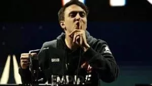 James “Clayster” Eubanks puts a finger to his mouth in a sush motion on the Call of Duty League stage.