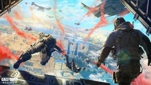 A group of soldiers jump out of a plane with flares in the sky as a promo image for Call of Duty Mobile.