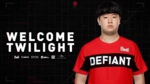 Overwatch League player Joo-Seok “Twilight” Lee stands in a Toronto Defiant jersey next to the words 