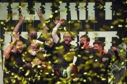 TSM's Brazilian Wild Rift roster cheer on stage after winning the Wild Rift Wild Tour Finals