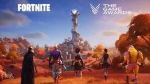 Five Fortnite characters in various outfits look towards a town with a tall spiraling tower. The Fortnite and Game Awards logos appear in the top corners.