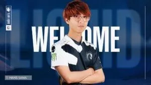 Pro LoL player Steven “Hans Sama” Liv stands with his arms folded in a TL jersey with the words 