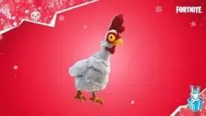 One of the chickens from the new Winterfest challenge in Fortnite Chapter 3 appears against a festive red background