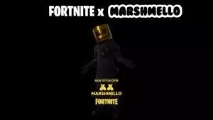 The DJ Marshmello appears in a black tracksuit with a gold helmet the words Fortnite x Marshmello appear above