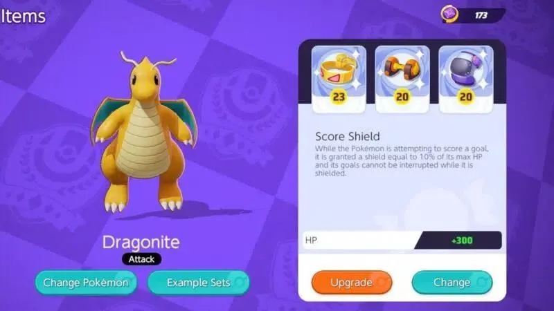 Экран загрузки для Dragonite, показывающий экипированные предметы Score Shield и Attack Weight.