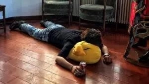 A Final Fantasy XIV player collapses onto a chocobo cushion